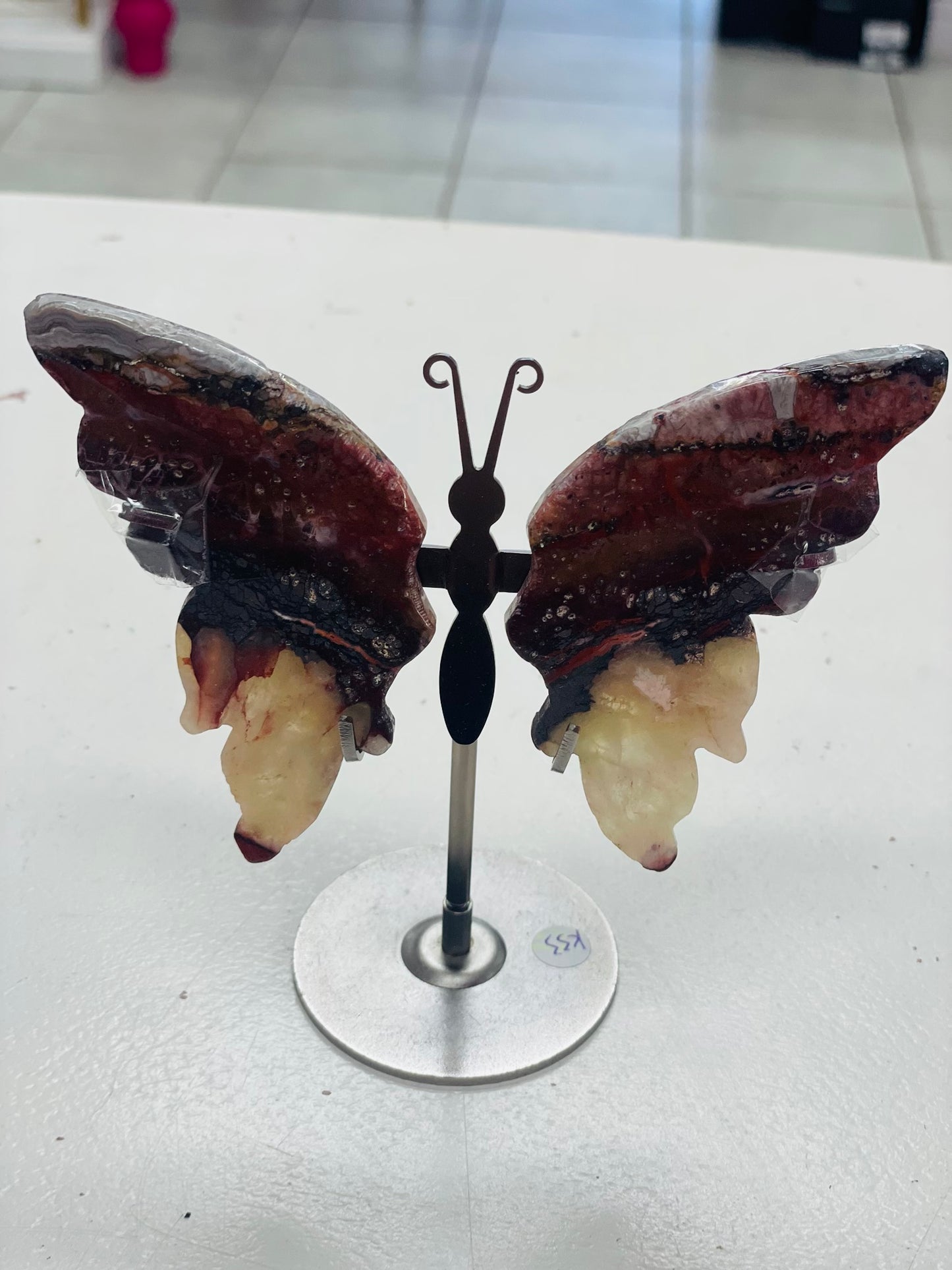 Crazy lace agate butterfly on stand