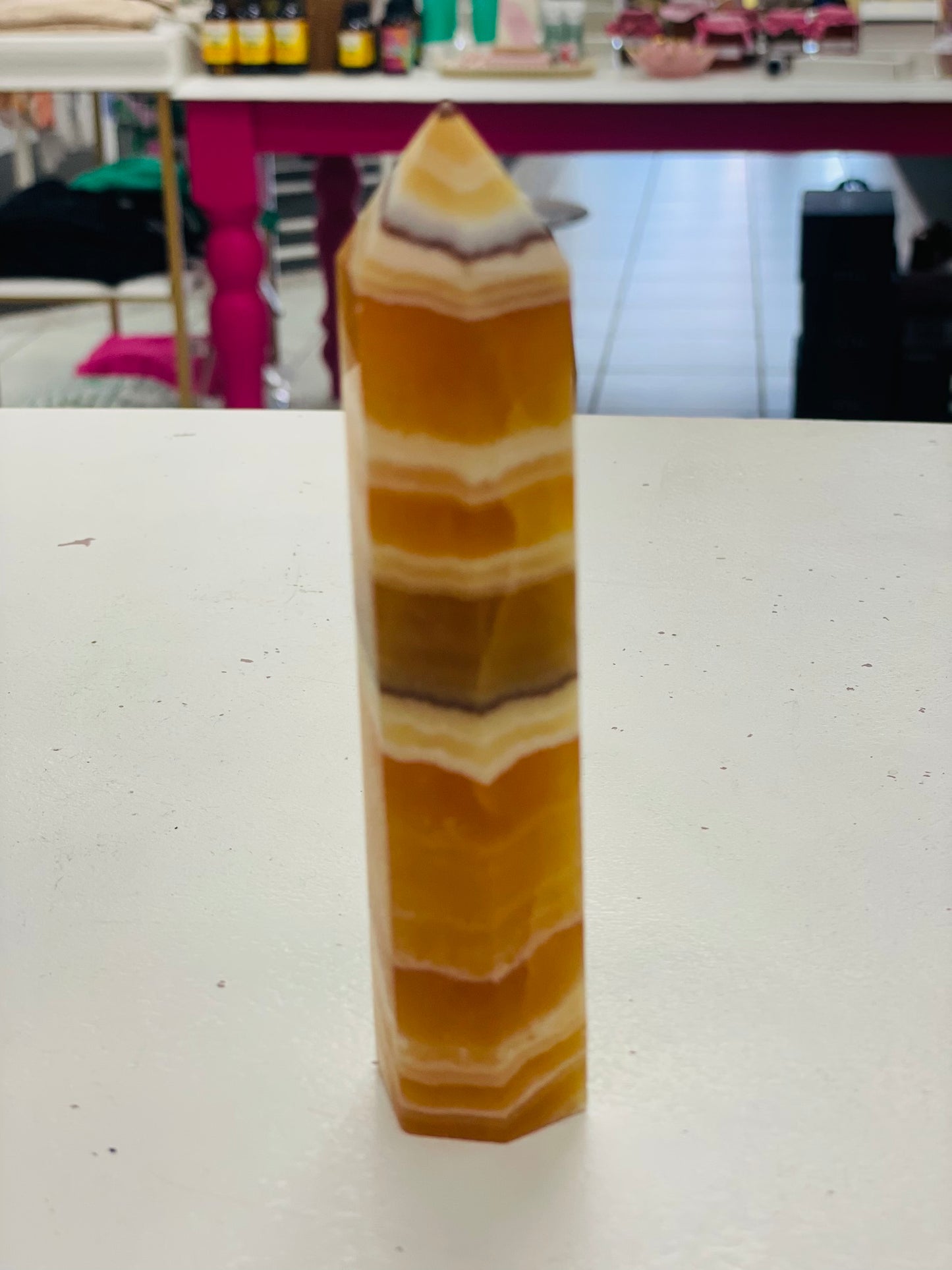Orange calcite point